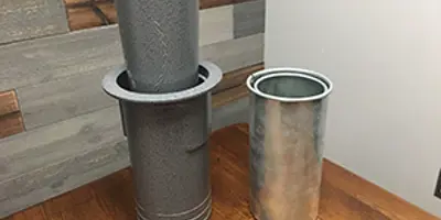 stacked metal flower vases