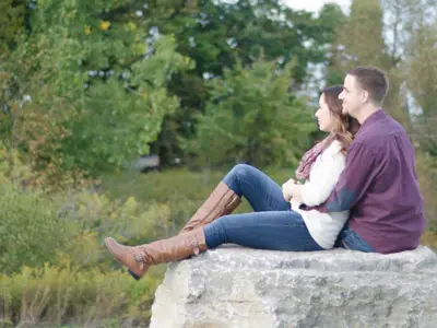 couple embracing on rock