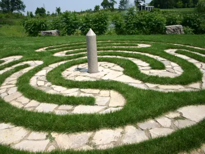 winding stone path in grass